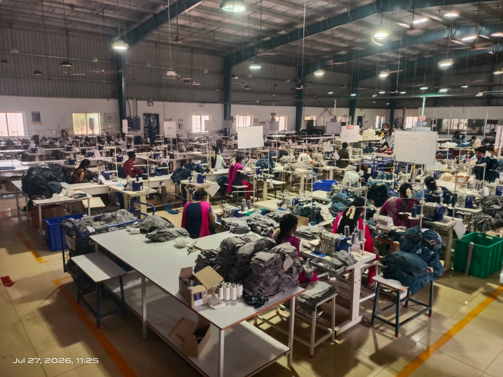 Masswin Exports production floor with rows of sewing machines